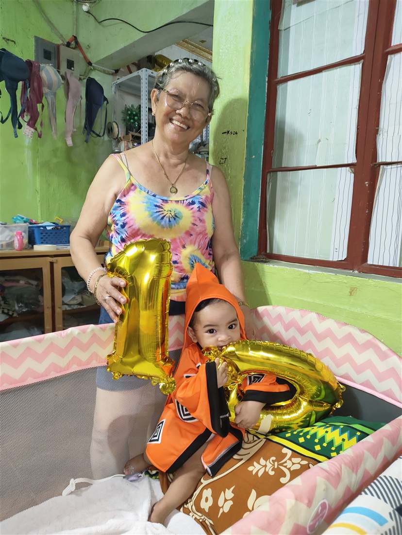 Hailee celebrating with a number one balloon